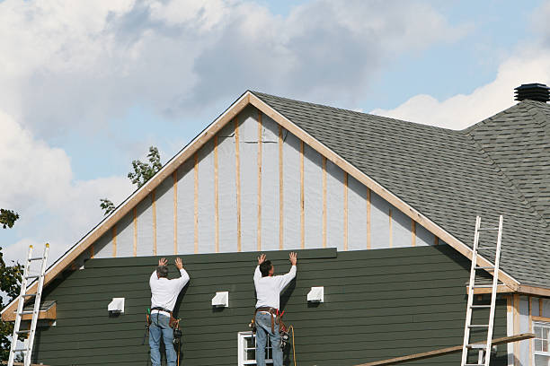 Professional Storm Damage Siding Repair technician working in Hartford, CT